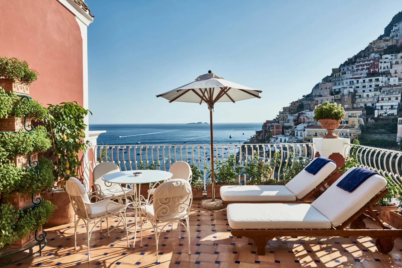 A private terrace with loungers looking over Positano